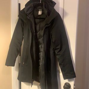 Patagonia jacket with hood and zip out liner.  Nice flair fit.